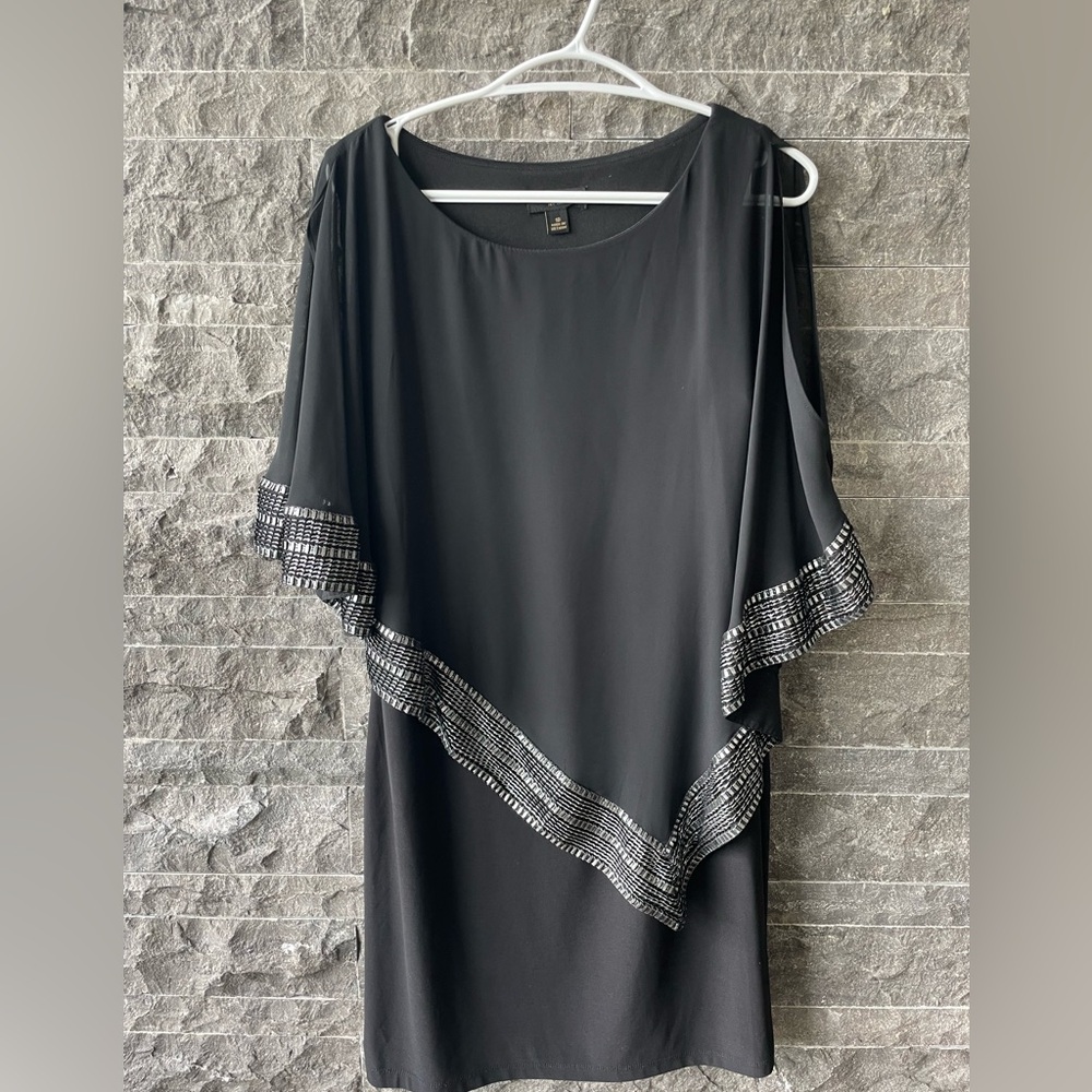 Black dress with sheer overlay
